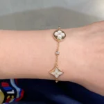 [LV]STAR AND SUN 4 MOTIF WHITE MOP GOLD BRACELET - Image 2