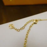 [LV] GOLD FLEUR DE LIS NECKLACE - Image 7